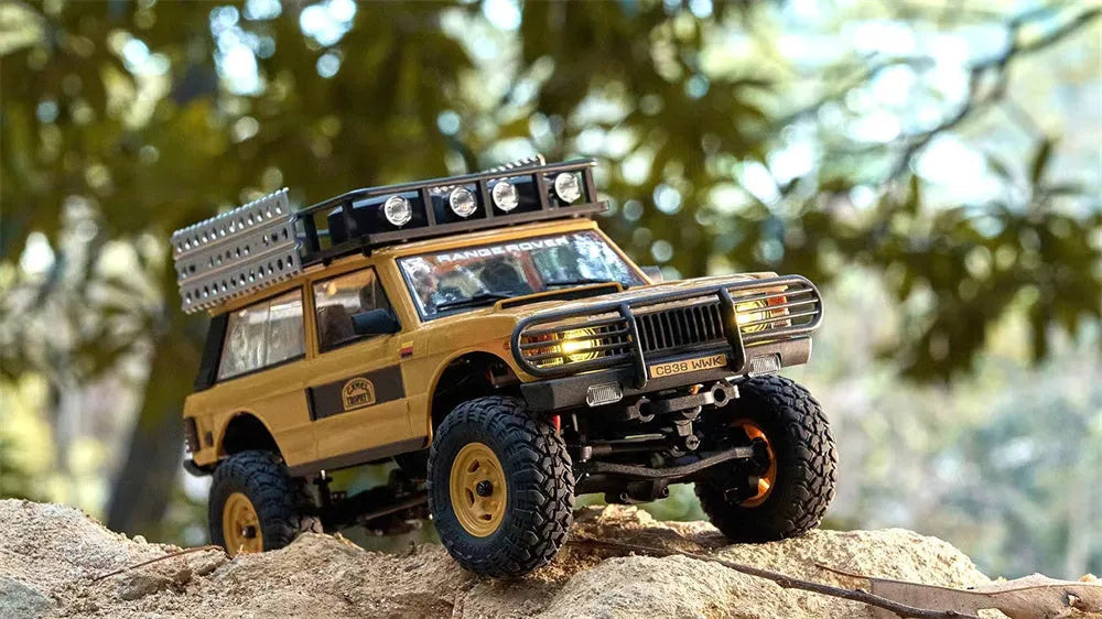 1/24 Scale RC Car 4WD 2.4G Authorized by Range Rover Camel Trophy Edition Rock Crawler Off-Road Climbing Truck Vehicles LED Lights